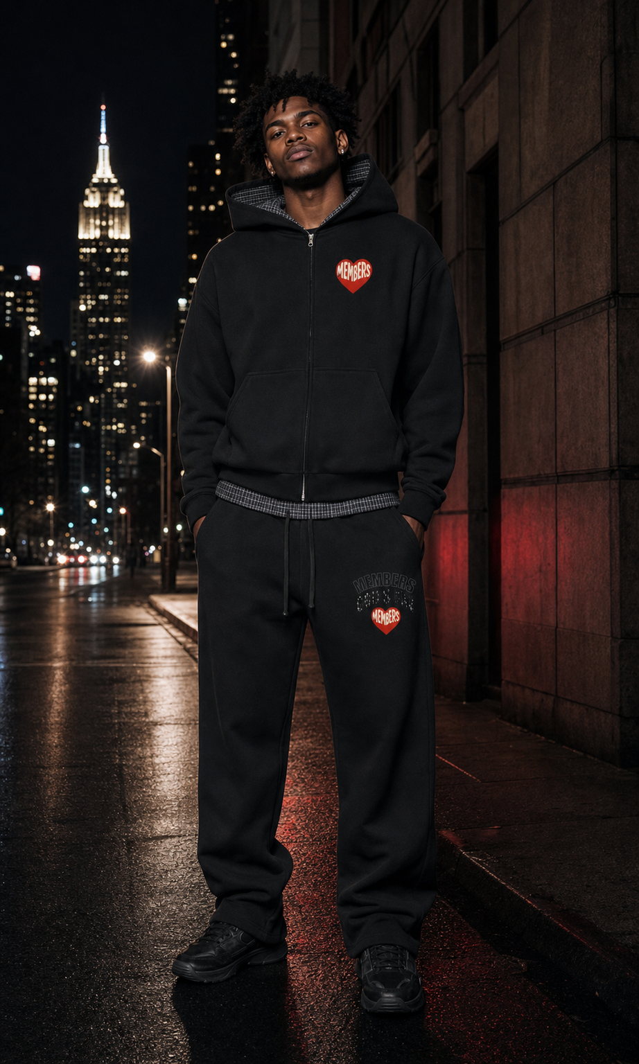 Original Members model wearing the plaid hoodie and sweatpants in New York